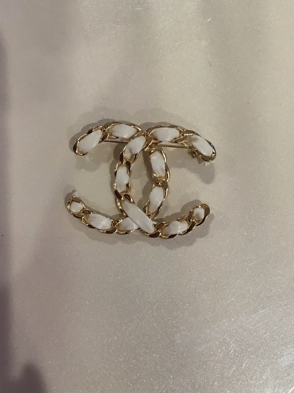 White and Gold Interwoven Double-C Logo Brooch